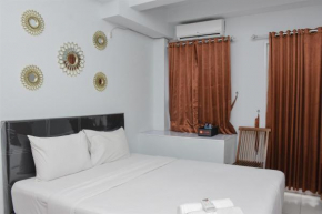Comfort Studio at Patraland Urbano Apartment By Travelio